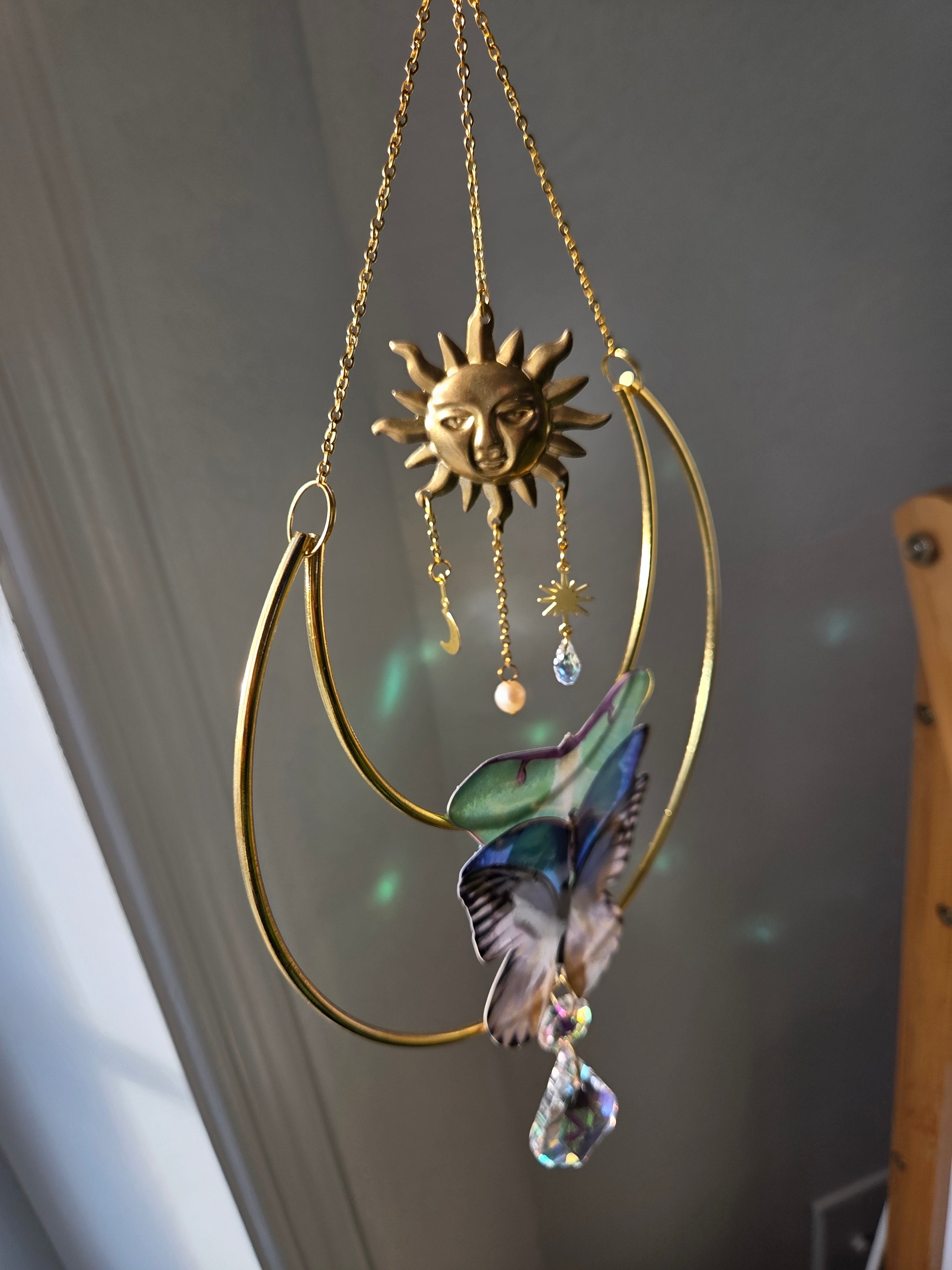 Trinité déesse papillon